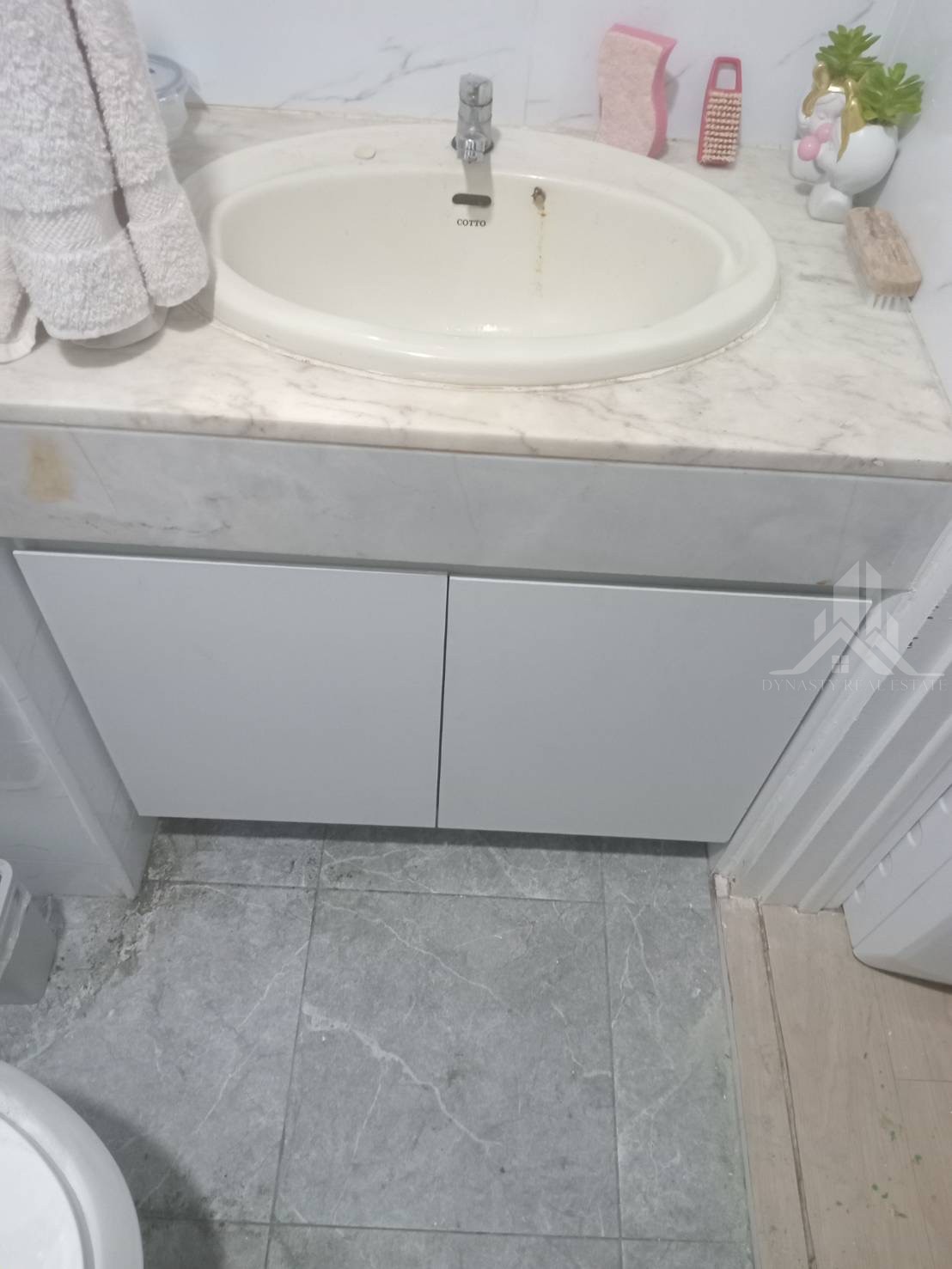 Completed: Built-In Wardrobes And Bathroom Vanity At Baan Suan Lalana For Sale In Pattaya Completed built-in bathroom vanity cabinet with two white doors under the sink at a baan suan lalana condo, jomtien
