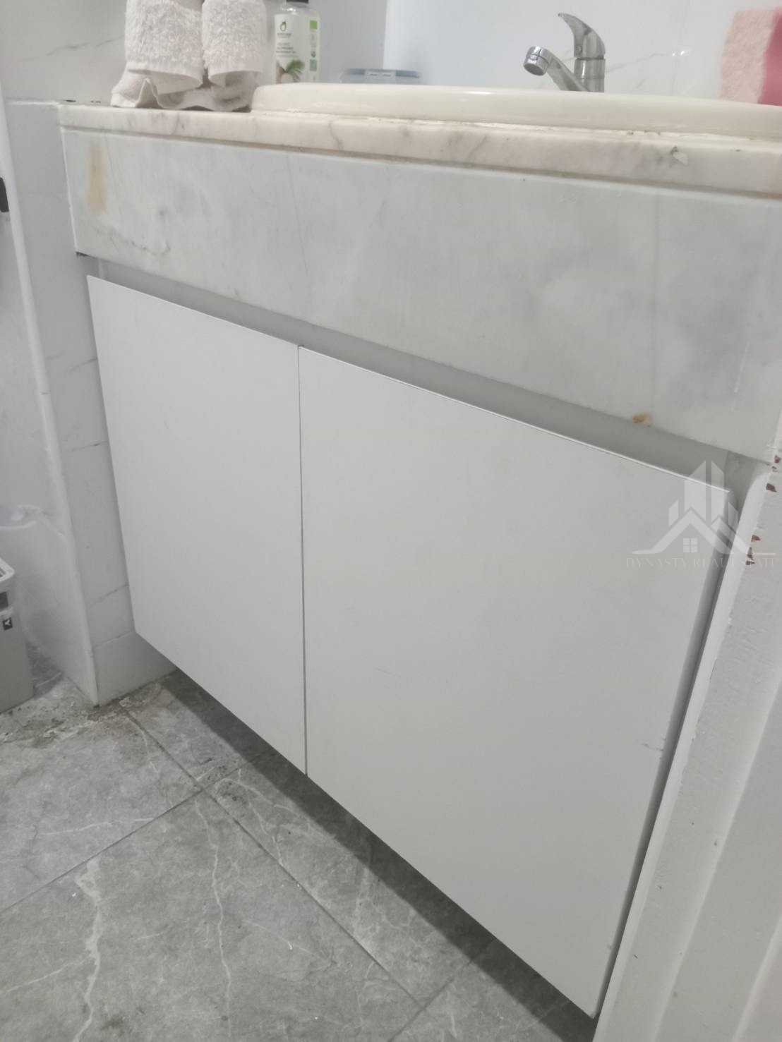 Completed: Built-In Wardrobes And Bathroom Vanity At Baan Suan Lalana For Sale In Pattaya New white bathroom vanity cabinet doors fitted under a marble counter at a baan suan lalana condo in jomtien, pattaya